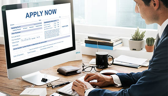 Foreign worker applying for a work permit Cambodia through the FWCMS online system.