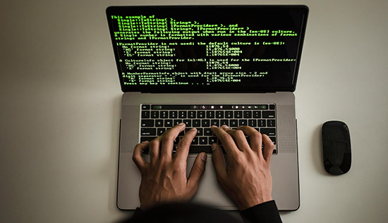 Smart contract developer creating decentralized applications (dApps).