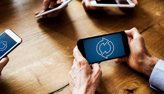 Technician sorting electronic waste for recycling and safe disposal