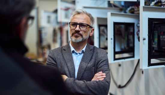 Senior technical operations director managing systems, teams, and workflow challenges in an enterprise setting