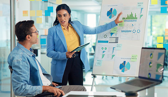 Business team working on SAP ERP system implementation planning.