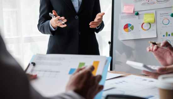 Business team streamlining operations to enhance delivery and success