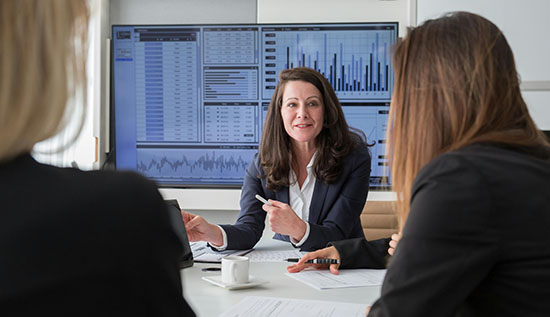 Data privacy manager, lawyer, and consultant discussing compliance strategies.