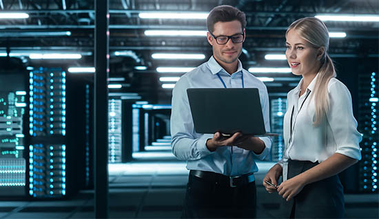 IT professional managing enterprise data storage systems with tools, cables, and server racks – storage administrator concept.