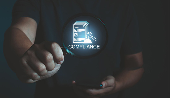 IT leaders discussing data privacy compliance strategies in an office setting.