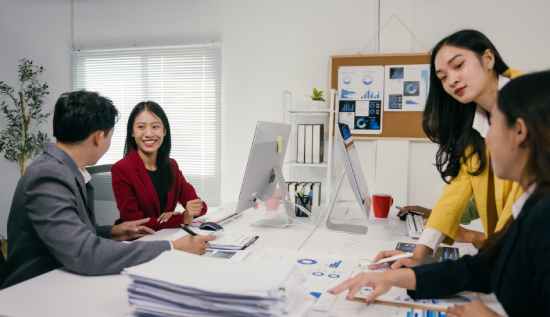 Resource manager analyzing project allocation and team scheduling in a company office setting