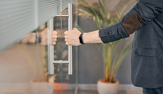 Workplace security measures to protect employees and business data, emphasizing the importance of cybersecurity, surveillance, and access control.