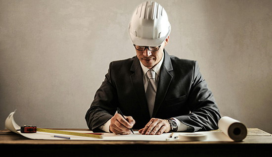 Technical architect working on system design with cloud infrastructure diagram, showcasing key skills and career development path in IT architecture.